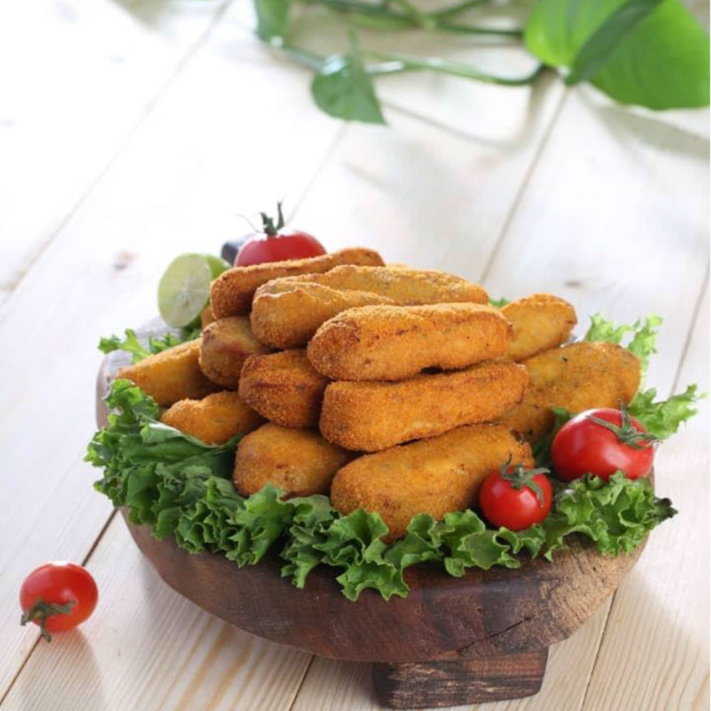 Golden croquettes filled with chicken and gooey cheese